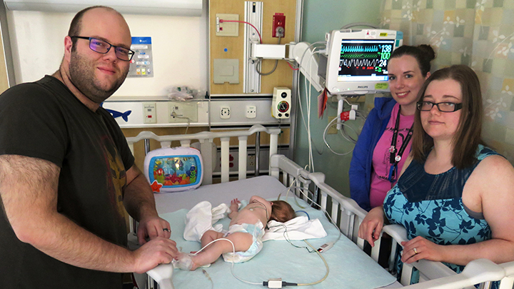 family with baby in hospital