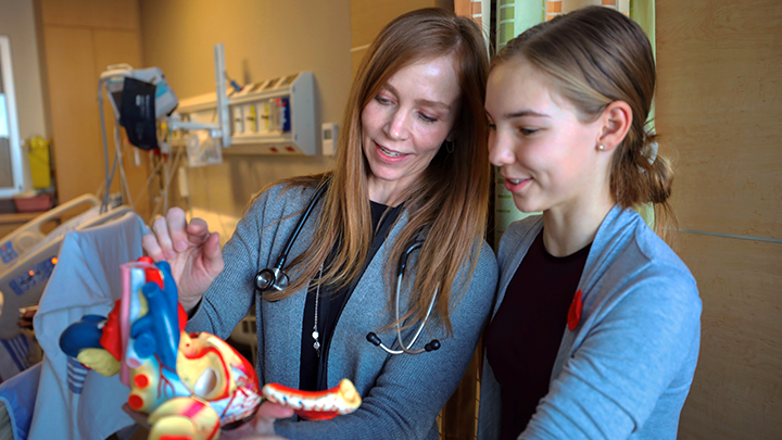 Natalie Gurr spent her day job-shadowing family friend and Nurse Practitioner Barb Aspinall, left, and learning about careers in healthcare on Take Our Kids to Work Day.