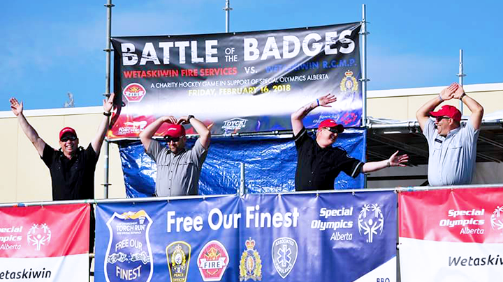 Jim Jones with AHS Protective Services, far right, dances to the YMCA song with other volunteers at the 2018 Free our Finest fundraising event in Wetaskiwin.