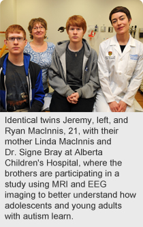 Identical twins Jeremy, left, and Ryan MacInnis, 21, with their mother Linda MacInnis and Dr. Signe Bray at Alberta Children's Hospital, where the brothers are participating in a study using MRI and EEG imaging to better understand how adolescents and young adults with autism learn. Dr. Bray is the principal investigator in the study and a member of Alberta Children's Hospital Research Institute.