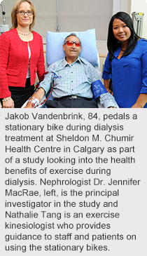 Jakob Vandenbrink, 84, pedals a stationary bike during dialysis treatment at Sheldon M. Chumir Health Centre in Calgary as part of a study looking into the health benefits of exercise during dialysis.  Nephrologist Dr. Jennifer MacRae, left, is the principal investigator in the study and Nathalie Tang is an exercise kinesiologist who provides guidance to staff and patients on using the stationary bikes. 