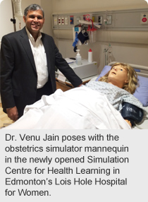 Dr. Venu Jain poses with the obstetrics simulator mannequin in the newly opened Simulation Centre for Health Learning in Edmonton’s Lois Hole Hospital for Women.