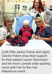 Left) RNs Janice Petruk and (right) Deirdre Peters show their support for their patient Lauren Stemmann and her mom Leneah while sporting some pink hair for the Hair Massacure event. 