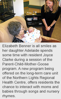 Elizabeth Benner is all smiles as her daughter Adelaide spends some time with resident Joyce Clarke during a session of the Parent-Child-Mother-Goose program. A new program being offered on the long-term care unit of the Northern Lights Regional Health Centre, offers residents the chance to interact with moms and babies through songs and nursery rhymes.