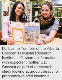 Dr. Lianne Tomfohr of the Alberta Children’s Hospital Research Institute, left, shares information with expectant mother Cat Gusztak as part of a research study looking at group therapy for pregnancy-related insomnia.