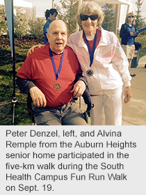 Peter Denzel, left, and Alvina Remple from the Auburn Heights senior home participated in the five-km walk during the South Health Campus Fun Run Walk on Sept. 19.