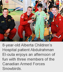 Eight-year-old Alberta Children’s Hospital patient Abdulrahman El-outa enjoys an afternoon of fun with three members of the Canadian Armed Forces Snowbirds.