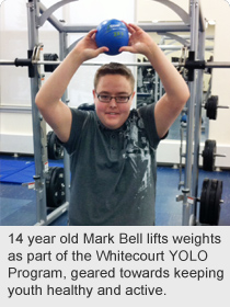 14 year old Mark Bell lifts weights as part of the Whitecourt YOLO Program, geared towards keeping youth healthy and active.