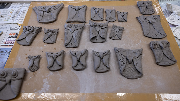Clay owls created by Crowsnest Pass Health Centre long term care residents and AHS volunteers during 'Clay with Cori'.