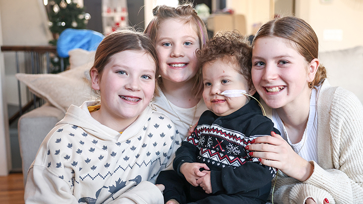 Colby was happy to be home for Christmas with his sisters, from left, Jamie, 11, Lenni, 8, and Rhyen, 12.