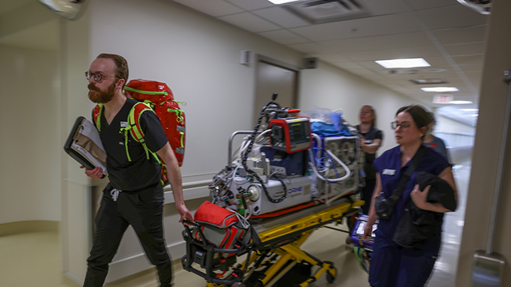The SANTS team moves through the hospital with a mobile intensive care isolette, designed to provide critical care for newborns in transit.