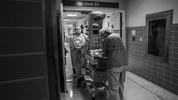 A teddy bear design brings a touch of softness as the team prepares a line for care.