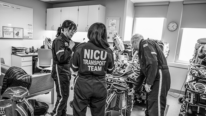 At the Foothills Medical Centre, the SANTS team prepares for their next transport. Each member is cross-trained to care for critically ill newborns both at the bedside and in motion.