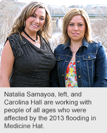 Natalia Samayoa, left, and Carolina Hall are working with people of all ages who were affected by the 2013 flooding in Medicine Hat.