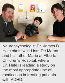 Neuropsychologist Dr. James B. Hale chats with Liam De Marco and his father Mario at Alberta Children's Hospital, where Dr. Hale is leading a study on the most appropriate use of medication in treating patients with ADHD. 
