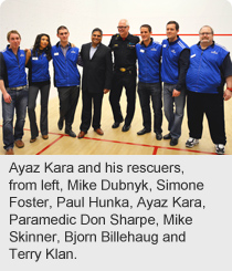 Ayaz Kara and his rescuers, from left, Mike Dubnyk, Simone Foster, Paul Hunka, Ayaz Kara, paramedic Don Sharpe, Mike Skinner, Bjorn Billehaug and Terry Klan.