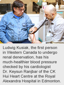 Ludwig Kusiak, the first person in Western Canada to undergo renal denervation, has his much-healthier blood pressure checked by his cardiologist Dr. Keysun Ranjbar