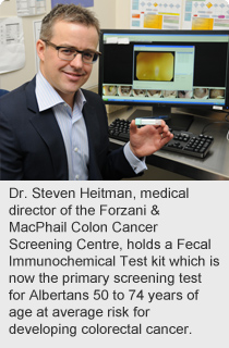 Dr. Steven Heitman, medical director of the Forzani & MacPhail Colon Cancer Screening Centre, holds a Fecal Immunochemical Test kit which is now the primary screening test for Albertans 50 to 74 years of age at average risk for developing colorectal cancer