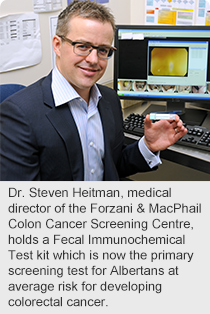 Dr. Steven Heitman, medical director of the Forzani & MacPhail Colon Cancer Screening Centre, holds a Fecal Immunochemical Test kit which is now the primary screening test for Albertans at average risk for developing colorectal cancer.