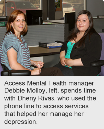 Access Mental Health manager Debbie Molloy, left, spends time with Dheny Rivas, who used the phone line to access services that helped her manage her depression.