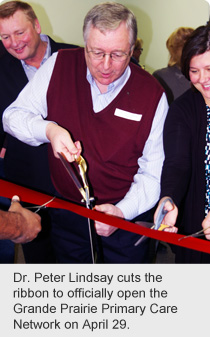 Dr. Peter Lindsay cuts the ribbon to officially open the Grande Prairie Primary Care Network on April 29.
