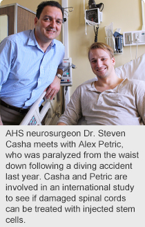 AHS neurosurgeon Dr. Steven Casha meets with Alex Petric, who was paralyzed from the waist down following a diving accident last year. Casha and Petric are involved in an international study to see if damaged spinal cords can be treated with injected stem cells.