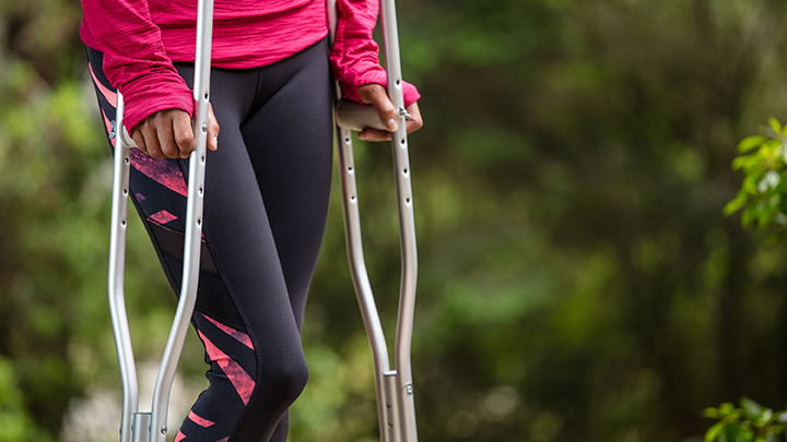 woman with crutches