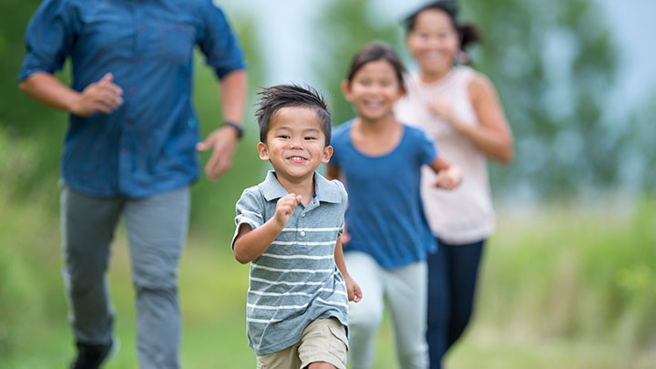 image of happy children running and playing tag