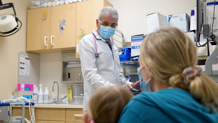 Caption for photo: Dr. Jay Patidar gives a young patient a checkup in the new pediatric clinic at WestView Health Centre in Stony Plain. Photo credit: Photo by Evan Isbister
