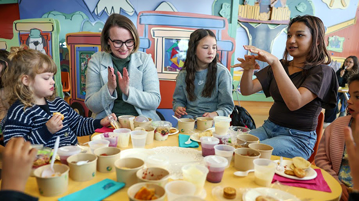 Patient and Family Advisory Council member Audrilyn Gunaratnam (second from right), joins fellow young taste testers during the launch of the new pediatric menu and room service model. Feedback from children and youth helped shape the new menu and dining experience.