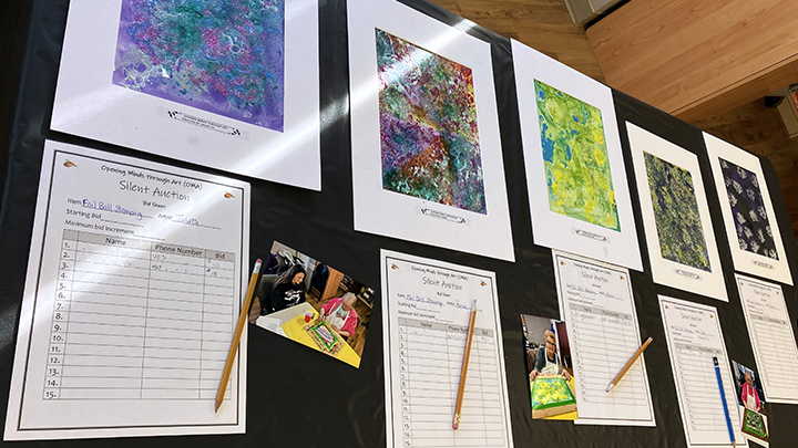 Funds raised at the Opening Minds through Art silent auction were donated to the Alzheimer Society.