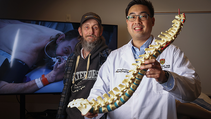 Todd Bene, left, and spine surgeon Dr. Michael Yang achieved what is believed to be a provincial first with Bene’s ‘awake surgery’ to repair a herniated disc and relieve severe leg pain.