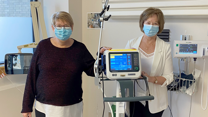 Valerie Messmer, president of Barrhead Healthcare Centre Auxiliary, and Linda Wolfram, site manager, pose with some of the equipment the auxiliary has helped buy, including a ventilator and bedside vital-sign monitor.