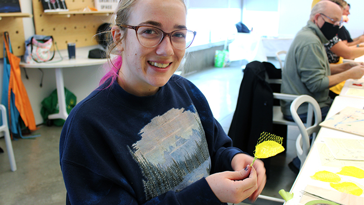 Taylor Kutsch fashions a flower at A Brush With Art, an outreach program of Alberta Health Services (AHS) Addiction and Mental Health in partnership with the Southern Alberta Art Gallery in Lethbridge. “Coming here has really boosted my confidence, and it’s helped me in other areas of my life too,” she says.