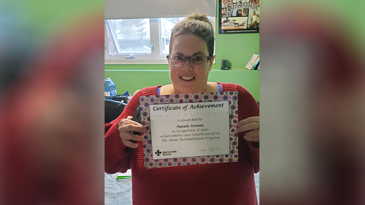 “It feels really good to see where I started and now where I've come. I'm seeing progress every day,” says Natalie Keenan, a Lethbridge client of the South Zone’s Home Rehabilitation Team, now celebrating its fifth anniversary. She’s proud to show her Certificate of Achievement.