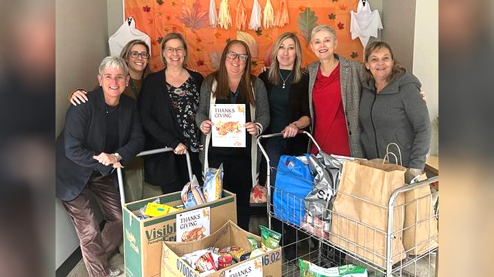 Members of the Southport home care teams gathered recently to deliver the proceeds from their Food Bank Challenge. From left are: Karen Butel, Laura Dwyer, Leann O’Brien, Michelle Johansen, Tanya Cooley, Michelle Copeland and Janet Frey-Sanderson.