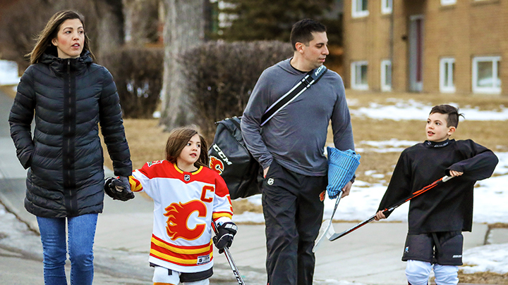 Chris Snow, third from left, enjoys time with his family — wife Kelsie and children Willa and Cohen — in 2020. When ALS claimed his life in 2023, his organ donations saved four lives. “Every time I got a message or phone call from (the donor coordinators) saying they had placed one of his organs (with a matching recipient), it was a very beautiful and emotional thing,” says Kelsie.