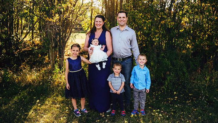 Christina Oxamitny, rear, poses with her husband Daniel and children Annabeth, Genevieve, Gabriel and Frederick. Christina is one of many clients who have benefitted from AHS breastfeeding support and services in Fort McMurray.