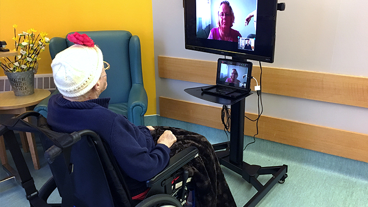 Priscilla McQueen enjoys a virtual visit with her daughter Sheila Bolduc at Willow Creek Continuing Care Centre. “I feel joy. It gives me a warm feeling,” she says.
