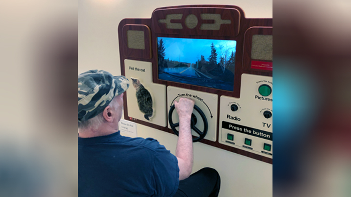 A long-term care patient enjoys time on the new ABBY system, a wall-mounted interactive computer, at Cold Lake Healthcare Centre. The ABBY provides meaningful activity and stimulation for residents with dementia and can be used as part of the long-term care residents’ recreation therapy program. The system was funded by the Cold Lake Healthcare Centre Ladies Auxiliary.