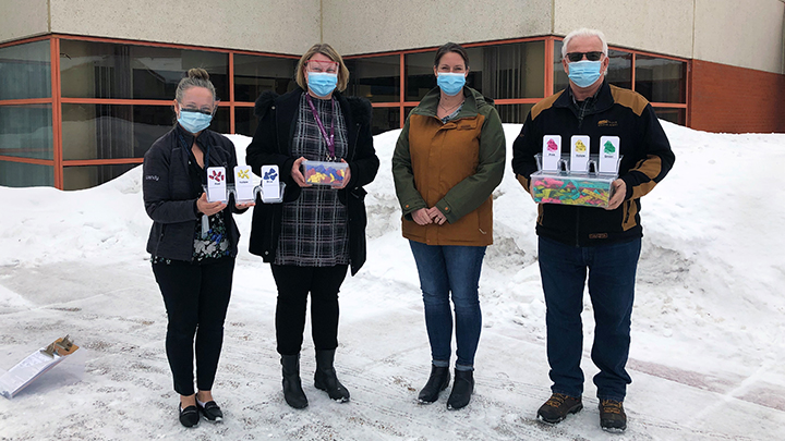 New Montessori Kit activities are now available to continuing care residents at the Cold Lake Healthcare Centre thanks to a donation to Hearts for Healthcare by Value Master Homes. Celebrating are, from left: Wendy Campbell, recreation therapist, Cold Lake Healthcare Centre; Sharon Winik, area manager, Allied Health Services, Area 8; Kari Leiper, executive director, Hearts for Healthcare; and Grant Benoit, co-owner of Value Master Homes.