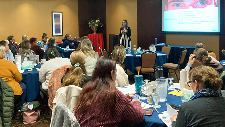 Michelle Agopsowicz, a family counsellor with the Grief Support Program at the AHS Richmond Road Diagnostic Treatment Centre, speaks during one of the 2024 engagement sessions.