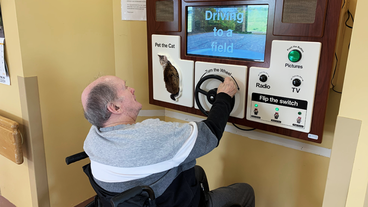 Resident Robert Smart enjoys a virtual drive on the ABBY system at Two Hills Hospital and Care Centre.