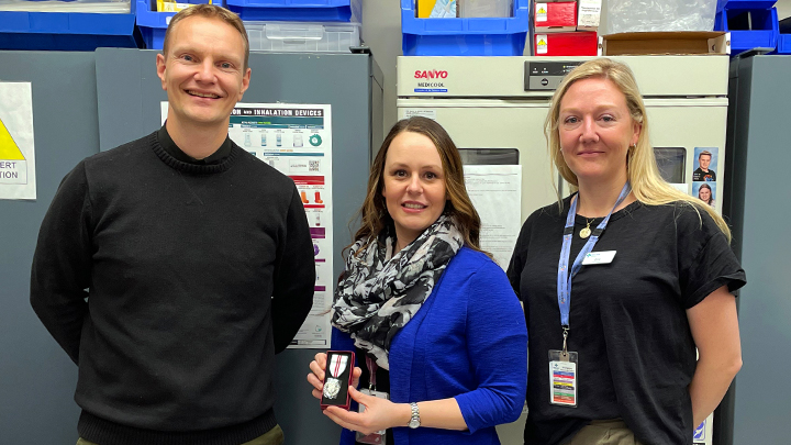 Pharmacist Dionne Hjelsing, centre, was recently presented with the QEII Platinum Jubilee Award by North Zone Pharmacy director Kevin Hofstede, left, and Northwest Rural Pharmacy manager Brie Schotz.