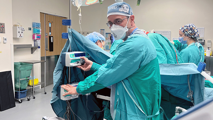 Dr. Timur Ozelsel administers anesthesia in the OR.