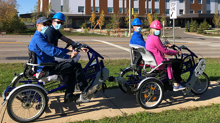  Last fall, AHS Facilities Maintenance and Engineering staff in Fort McMurray showed how a custom-built e-bike can accommodate up to four people.
