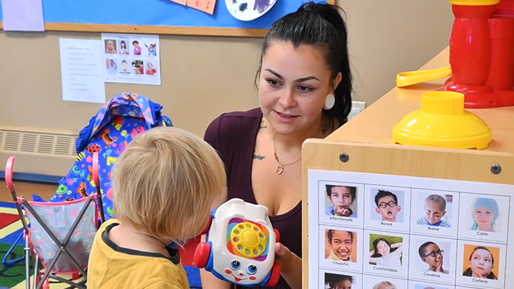 Tori enjoys some quality time with her child as part of the EMBRACE program.