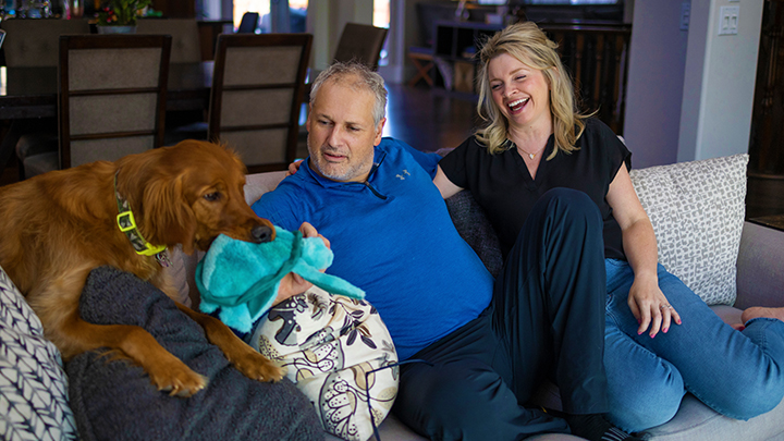 Erin Day, right, leads a busy life as primary caregiver to her husband Shannon. This working Calgary mother of two young children is also a member of AHS’ Patient and Family Advisory Group as well as an occupational therapist.