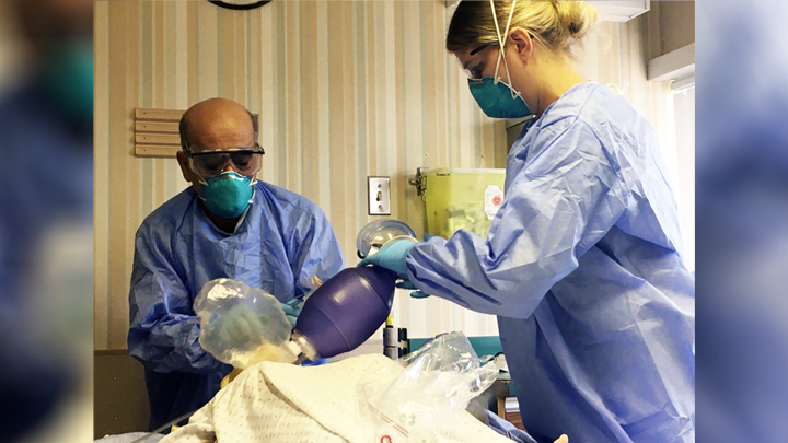 Respiratory Therapist Ghulam Nabi, left, and Registered Nurse Ashley Hagg participated in COVID-19 Code Blue simulation training on the Intensive Care Unit at the QEII Hospital in Grande Prairie.