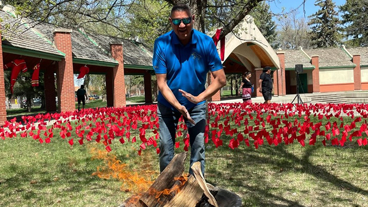 Les Vonkeman, on behalf of the Honouring Traditions and Reconciliation Society, lights the fire at a Fireside Connection event hosted in collaboration with Alberta Health Services, the City of Lethbridge and Lethbridge’s Family Centre.